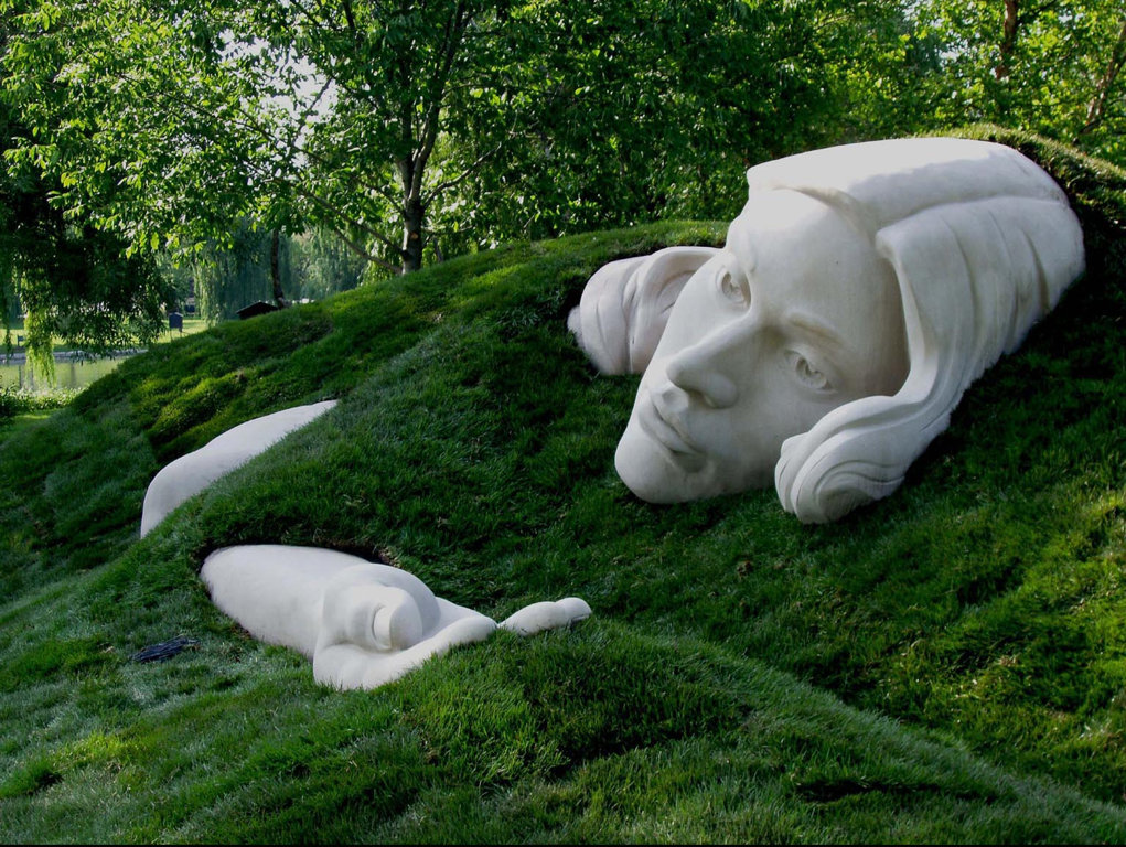Earthworks and Indiana Limestone sculpture, Awakening Muse Sculpture, by Meg White Sculpture Studio