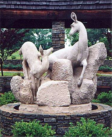 Doe and fawn crossing stream, sculpture by Meg White 1998 and Fawn Crossing Stream, 1998 Sculpture by Meg White